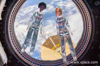 Trading dress-up for lift-off, Barbie flies on space station for first time