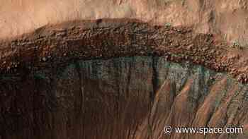 Frosty Mars crater sparkles in new NASA photo