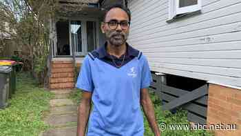 With no tradies available, Atul is repairing his flood-ravaged Brisbane home himself