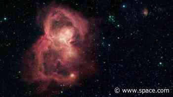 Butterfly Nebula glows red in spectacular image from NASA's Spitzer Space Telescope