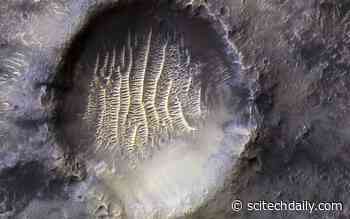 Breathtaking NASA Photo of Martian Crater Looks Like “Alien Footprint”