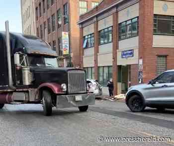 Tractor-trailer strikes cars, parking meter on Forest Avenue Friday morning - Press Herald