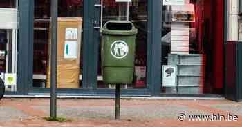 Boom steekt vuilbakjes in het nieuw - Het Laatste Nieuws