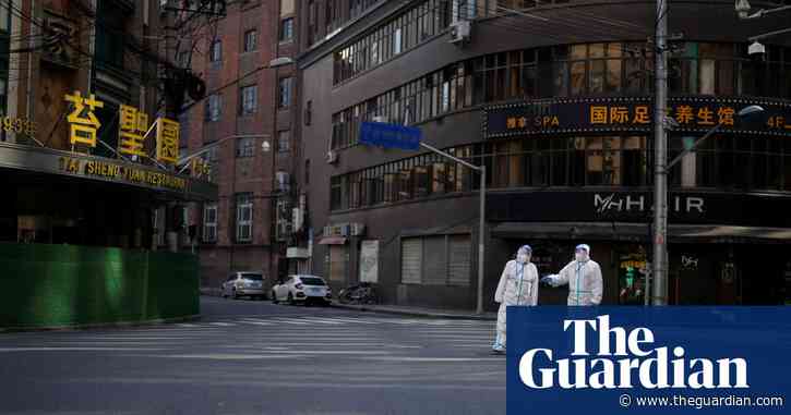 China tightens controls as Shanghai reports record Covid cases
