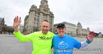 Dad and son finish 'toughest' half marathon 19 days after everyone else - Liverpool Echo