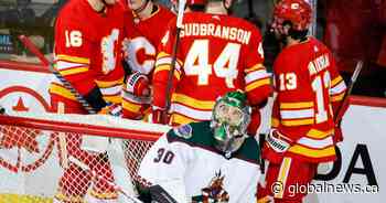 Flames secure playoff spot with help from Oilers, then thump Coyotes 9-1