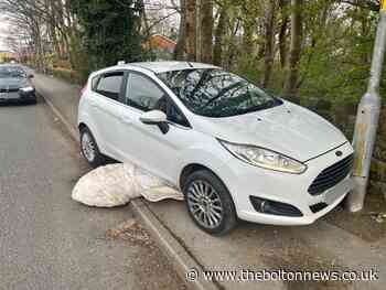 Stolen car abandoned in Bromley Cross after police pursuit
