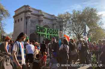 Two people climb Marble Arch amid protests against fossil fuels - Ealing Times