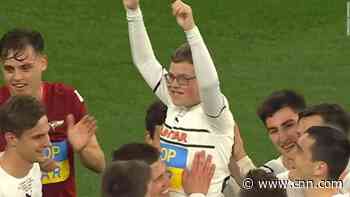 12-year-old refugee from Mariupol scores goal in football match