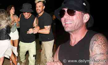 Ryan Phillippe has a huge grin on his face as he leaves Coachella with two ladies - Daily Mail