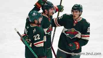 Spurgeon scores in OT, Wild beat Sharks to take playoff spot - Belleville News-Democrat