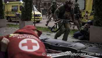 Blasts rock Ukraine as bodies line streets - Western Advocate