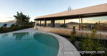 tense architecture network adds circular pool to concrete island residence in greece - Designboom