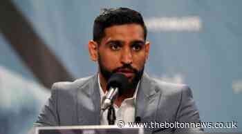 Bolton's Amir Khan says luxury watch stolen at gun point in London