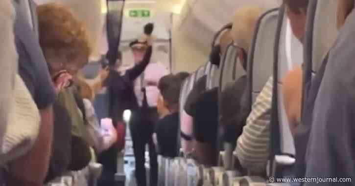 Video: Packed Plane Erupts the Moment Passengers Learn Masks Are No Longer Required