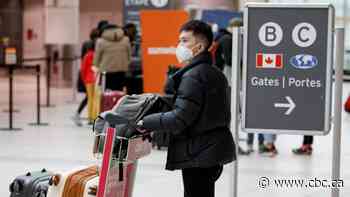 Ottawa to maintain mask requirement for travellers after U.S. drops rule: transport minister