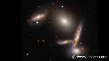 Hubble Space Telescope celebrates 32nd anniversary with gorgeous gravitational 'dance' photo