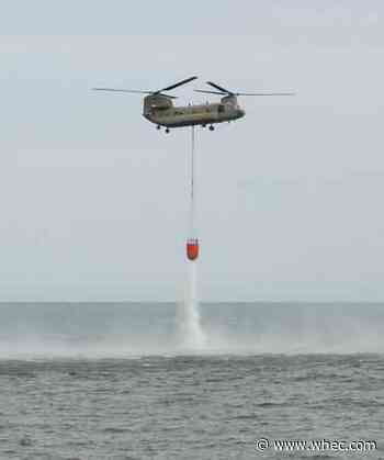 NY Army Guard Helicopter crews conduct fire bucket training over Lake Ontario