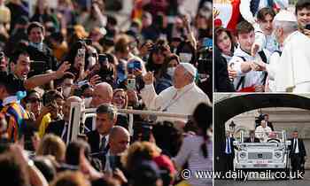 Thousands attend Pope's first papal audience in St Peter's Square since coronavirus outbreak - Daily Mail