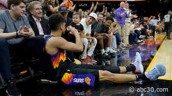 Devin Booker's fist bump with a baby is the heartwarming highlight of the NBA playoffs