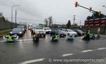 Two arrested for blocking traffic on Highway 1 off-ramp - The Squamish Reporter