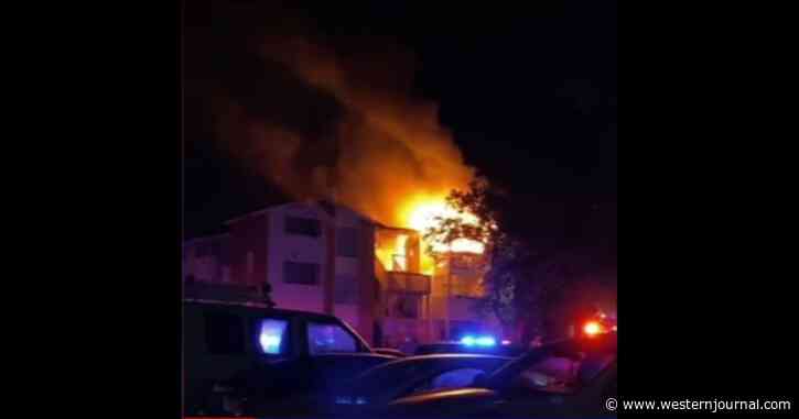 Firefighters Save Man and Dog Trapped on Third Floor of Burning Apartment with No Way Out