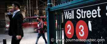 Wall Street termine en baisse, contrariée par la Fed