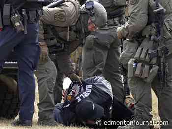 Suspects arrested after Edmonton police identify stolen vehicle