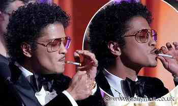 Grammys viewers astounded as Bruno Mars lights up cigarette on stage - Daily Mail