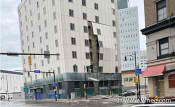 Crews continue cleanup after debris falls from Downtown Rochester building Thursday