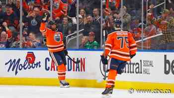 Kane scores hat trick as Oilers clinch playoff spot with win over Avalanche