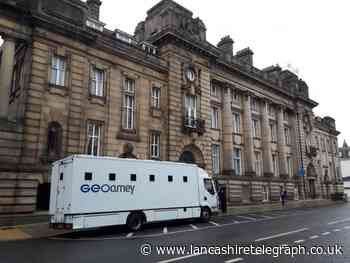 Burnley man threw bedside table at his partner