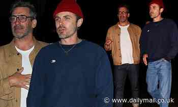 Jon Hamm and Casey Affleck pull off casual chic as they arrive at a pre-Grammys party in Los Angeles - Daily Mail