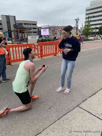 Boyfriend pops the question at Top City Half Marathon - WIBW
