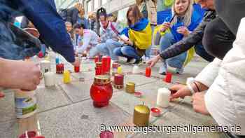 Kundgebung in Augsburg: Menschen trauern um Opfer in Ukraine