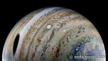 Shadow of Jupiter's largest moon looms in magnificent new Juno photo - Space.com