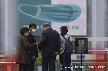 Shanghai erects metal barriers in fight against COVID-19 - The Brandon Sun