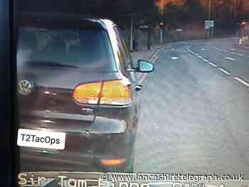 Police spot five children jumping around unrestrained in the back of a car