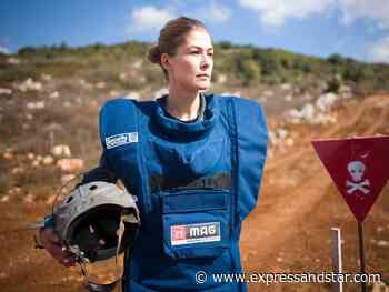 Actress Rosamund Pike backs campaign to clear unexploded bombs in Laos - Express & Star