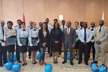 12 Customs officers sworn in by Justice Minister Richardson - The Daily Herald