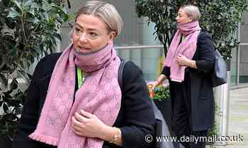 Lisa Armstrong wraps up in a black coat as she heads to work on Celebrity Catchphrase - Daily Mail