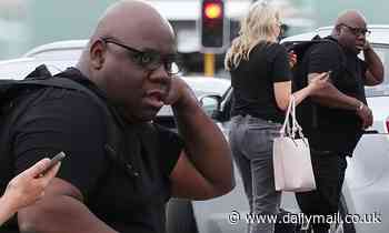 DJ Carl Cox cuts a low-key figure in a polo shirt and black pants in Perth - Daily Mail