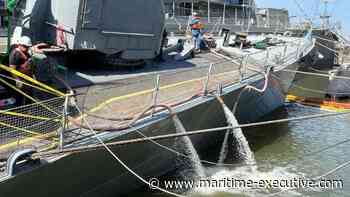 Divers Plug Holes in the Hull of Museum Ship USS The Sullivans - The Maritime Executive