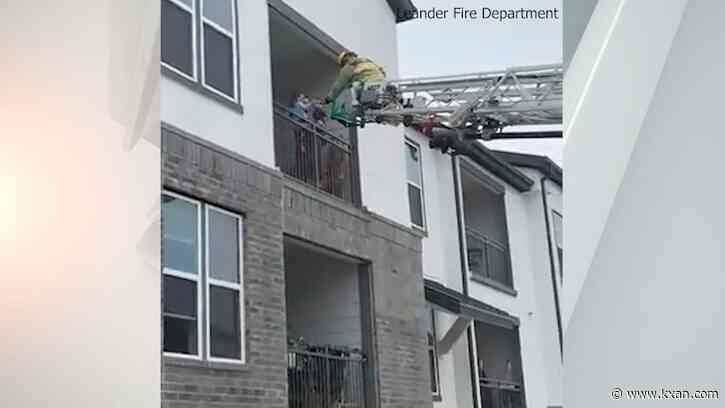 VIDEO: Leander firefighter delivers stickers to kids on 3rd floor balcony