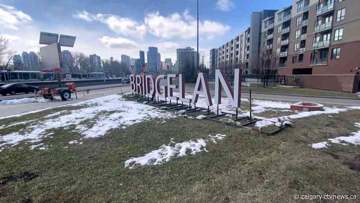 Woman faces charges after Bridgeland sign loses 'D' in crash