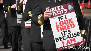 Delta pilots picket at SEA, citing fatigue from staffing shortfall - KIRO Seattle