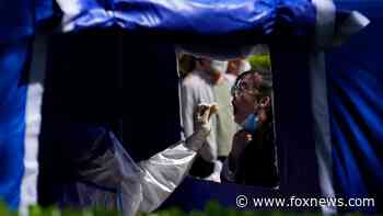 Beijing conducts mass COVID testing, enforces lockdowns