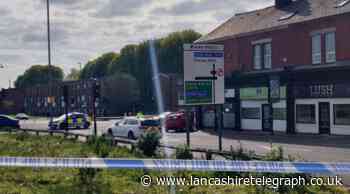 Large police presence as car crashes into Blackburn hairdressers
