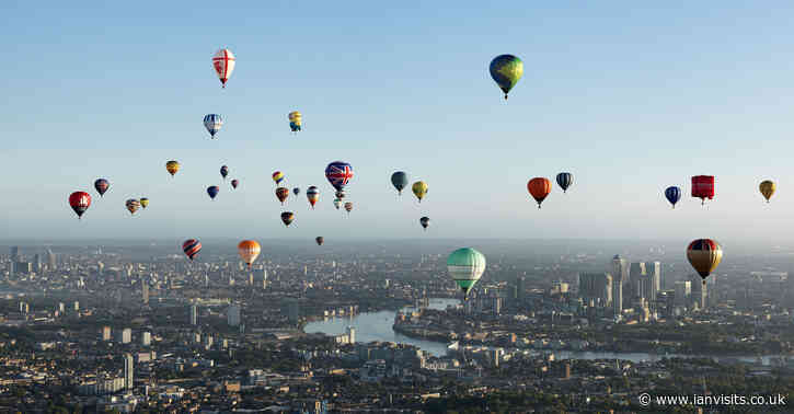 See hot air balloons drifting over central London