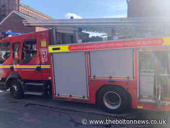 Bolton: Fire crews lead resident to safety after pan left on stove - The Bolton News